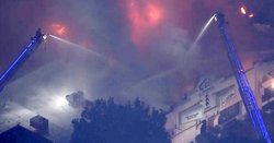 Massive fire destroys Santa Clarita business, threats neighboring buildings